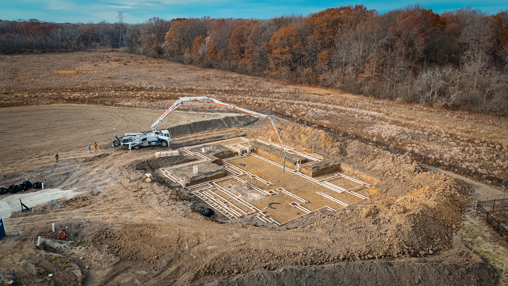 Concrete foundation being poured at the first Cedarview Estates homesite in November 2025